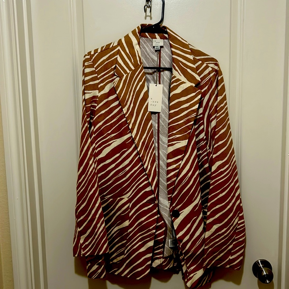 A new day brown zebra print blazer and shorts, will sell separately if needed XL